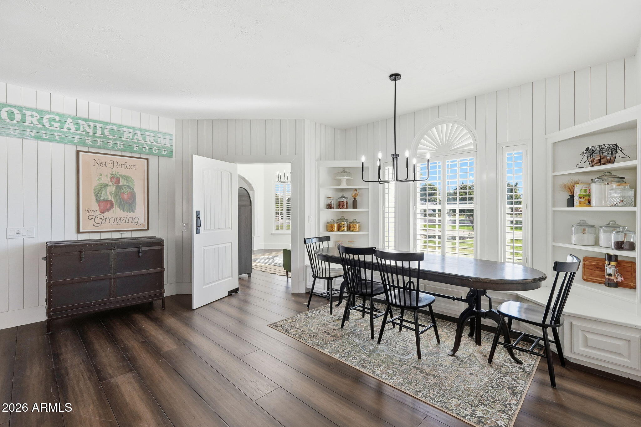 4222 East McLellan Road, Unit 15 Mesa, AZ 85205 - Photo 25 of 86 a view of a dining room with furniture window and wooden floor