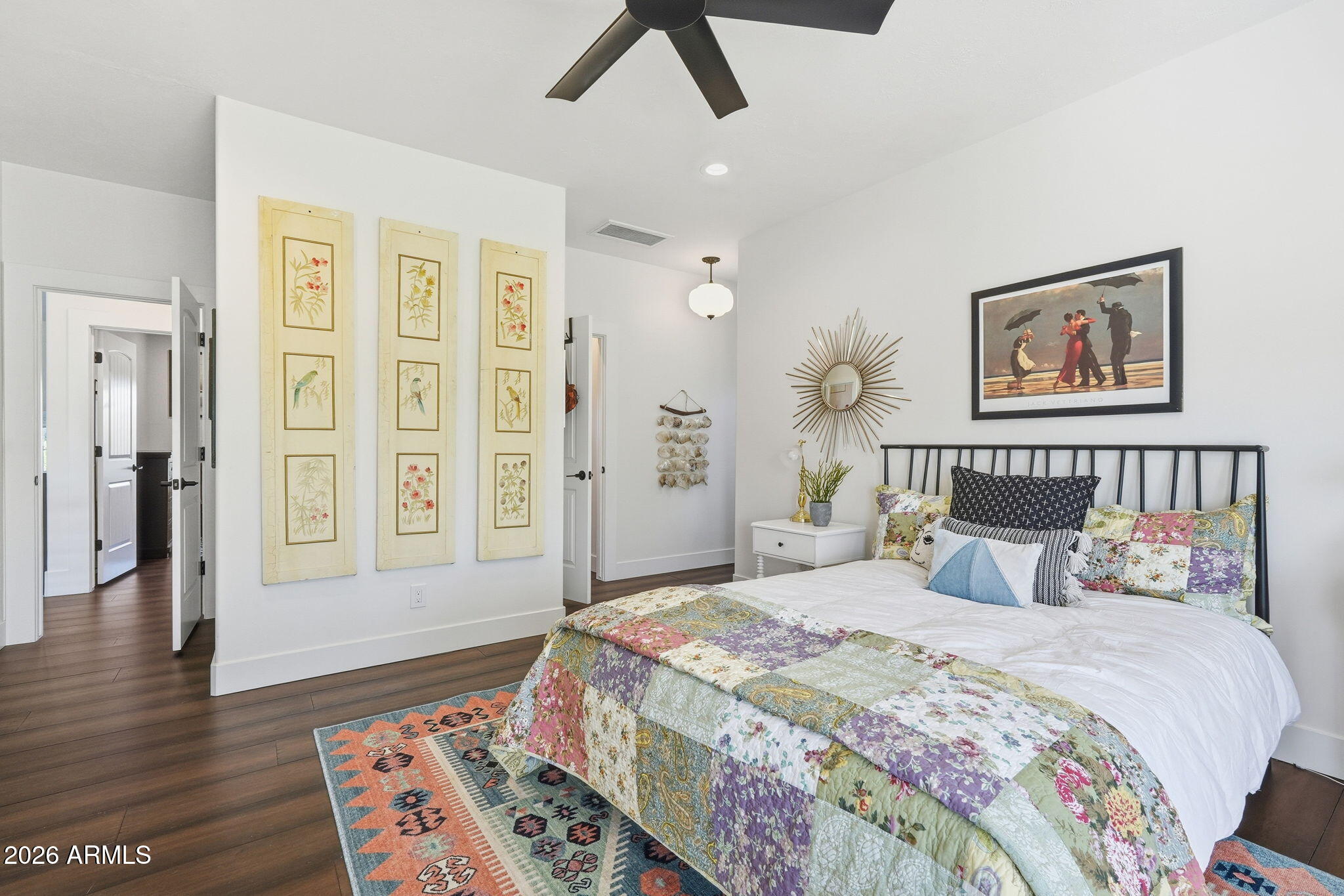 4222 East McLellan Road, Unit 15 Mesa, AZ 85205 - Photo 48 of 86 a bedroom with a bed and a painting on the wall