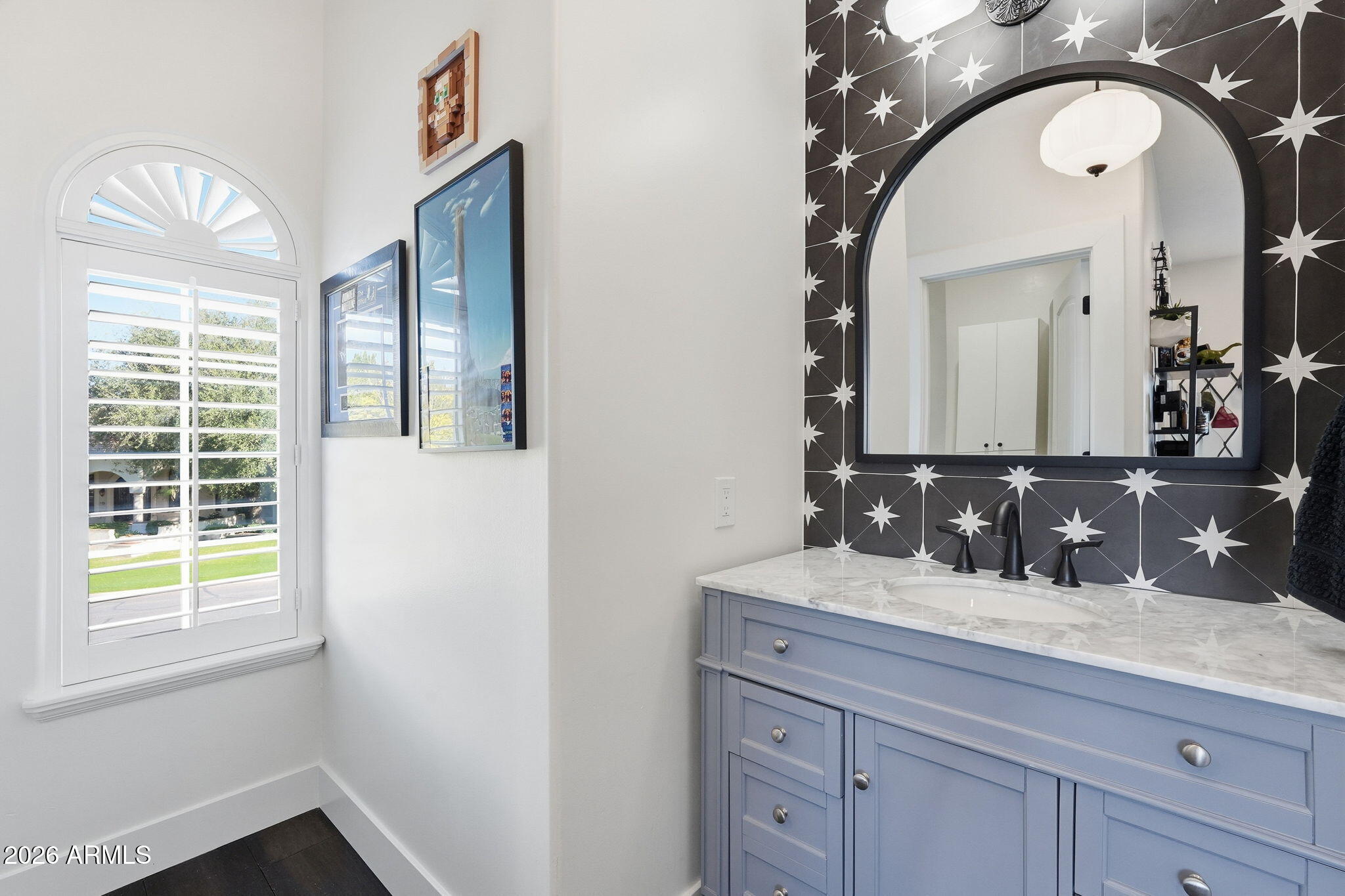 4222 East McLellan Road, Unit 15 Mesa, AZ 85205 - Photo 55 of 86 a bathroom with a sink and a mirror