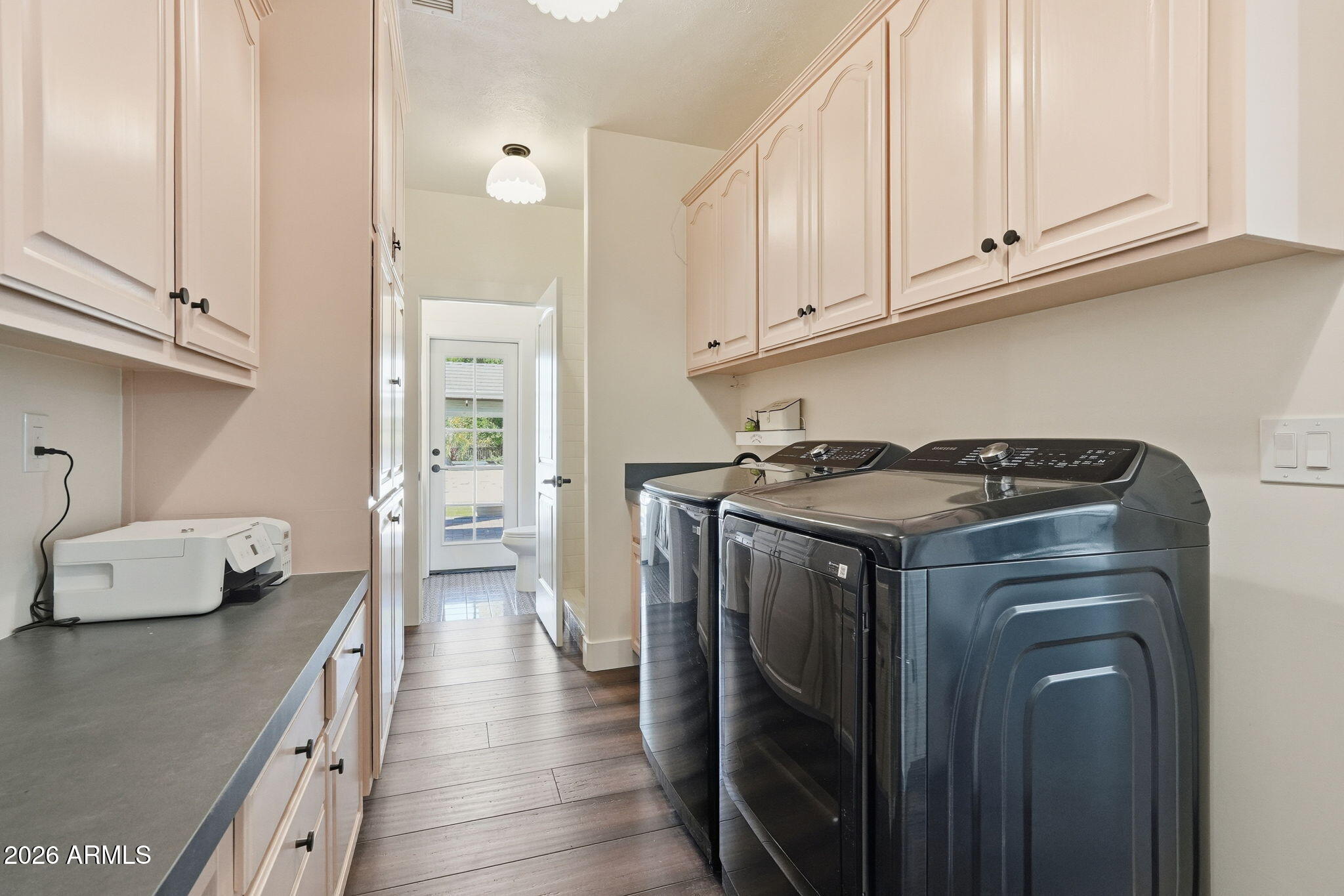 4222 East McLellan Road, Unit 15 Mesa, AZ 85205 - Photo 59 of 86 a kitchen with stainless steel appliances granite countertop a stove a refrigerator and a cabinets