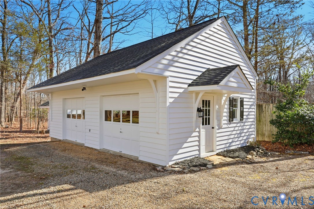 3264 Sherwood Ridge Way Powhatan, VA 23139 - Photo 33 of 40 a front view of a house with a yard