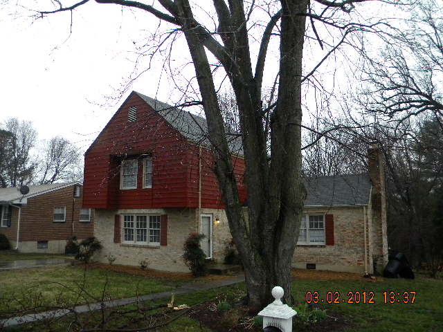 5331 Twilight Road Roanoke, VA 24019 - Photo 2 of 14 a front view of a house with a garden