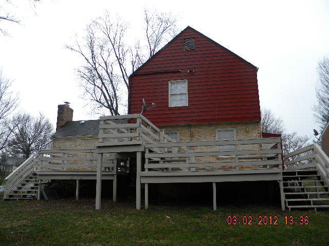 5331 Twilight Road Roanoke, VA 24019 - Photo 13 of 14 a view of a house with a wooden deck and a yard