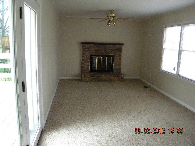 5331 Twilight Road Roanoke, VA 24019 - Photo 7 of 14 a view of an empty room and a fireplace
