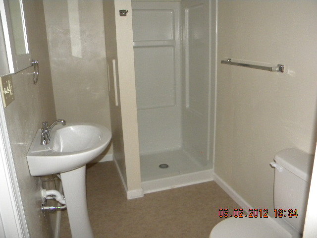 5331 Twilight Road Roanoke, VA 24019 - Photo 10 of 14 a bathroom with a sink toilet and shower