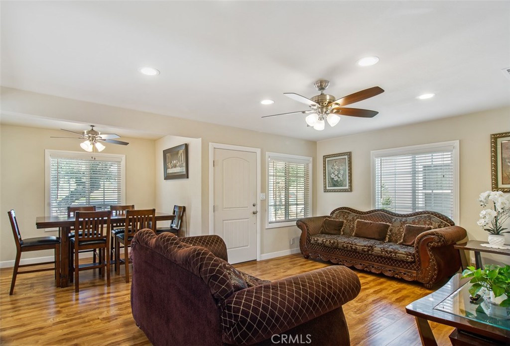 7192 9th Street Buena Park, CA 90621 - Photo 11 of 24 a living room with furniture kitchen view and a window