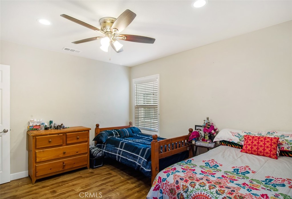 7192 9th Street Buena Park, CA 90621 - Photo 13 of 24 a bedroom with two beds and painted walls
