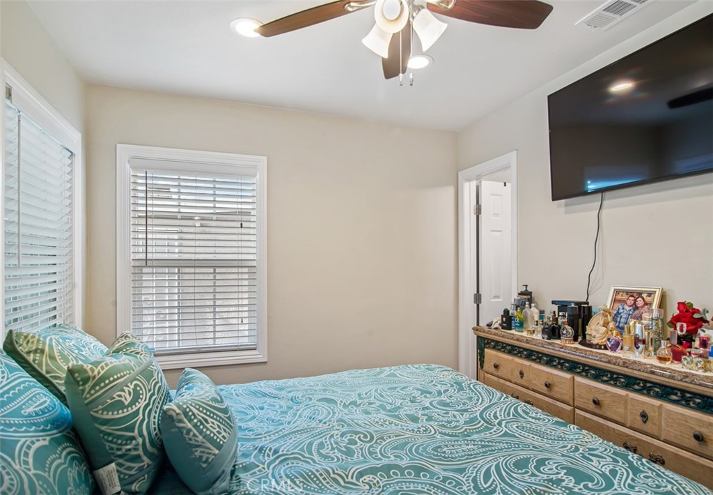 7192 9th Street Buena Park, CA 90621 - Photo 14 of 24 a bedroom with furniture and a flat screen tv