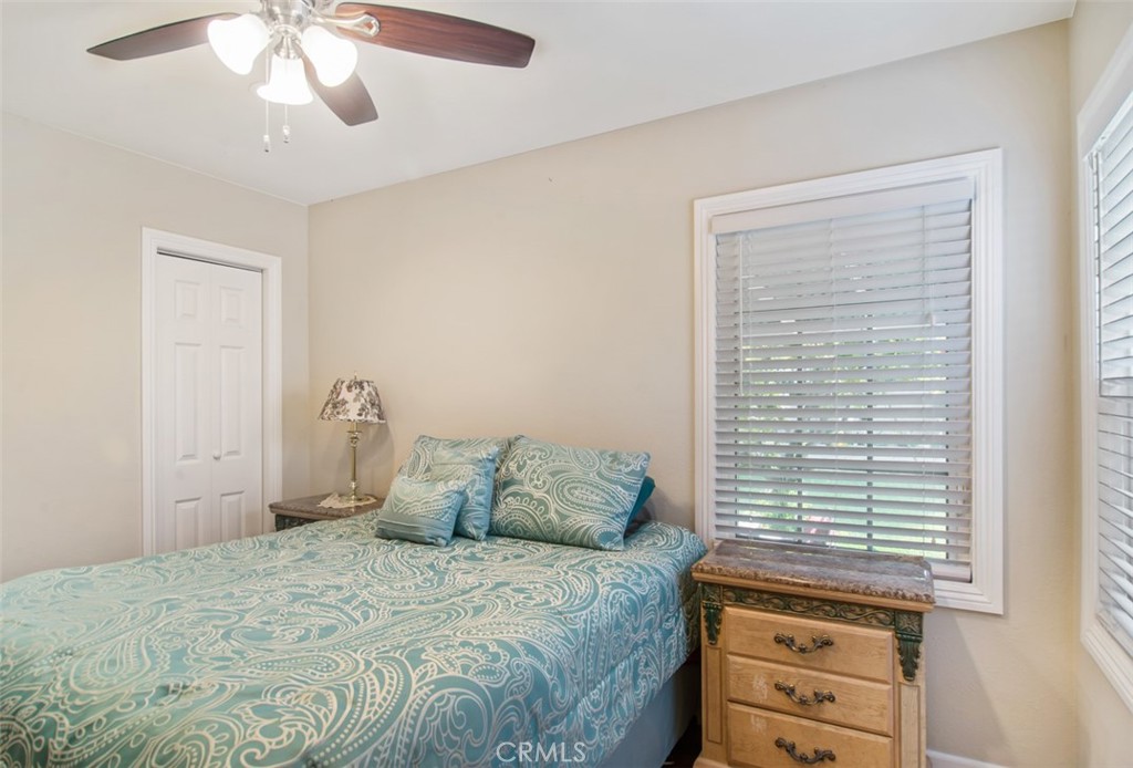 7192 9th Street Buena Park, CA 90621 - Photo 15 of 24 a bedroom with a bed and a dresser