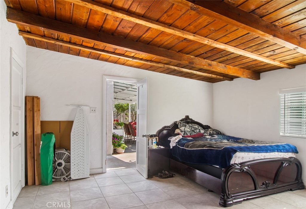 7192 9th Street Buena Park, CA 90621 - Photo 19 of 24 a room with furniture and a window