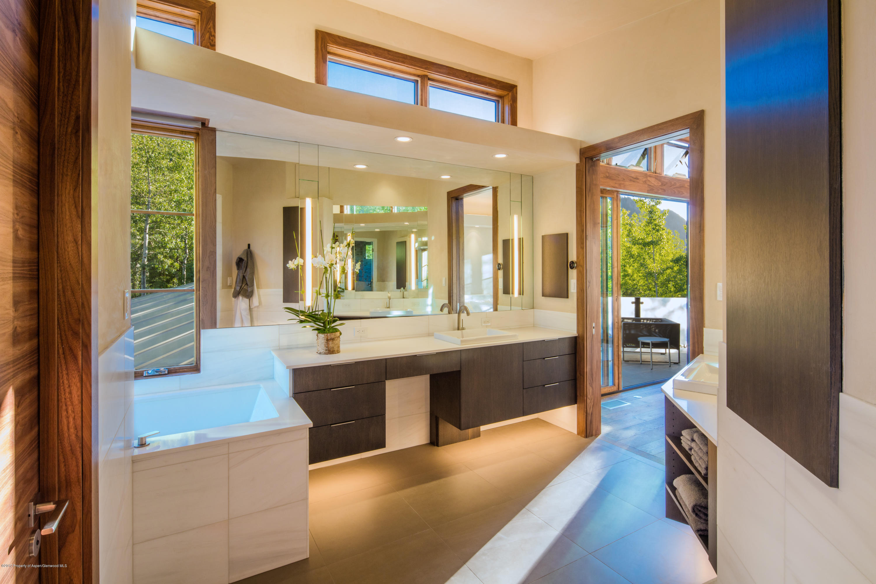 1195 Riverside Drive Aspen, CO 81611 - Photo 13 of 19 a large living room with stainless steel appliances granite countertop furniture and a large window