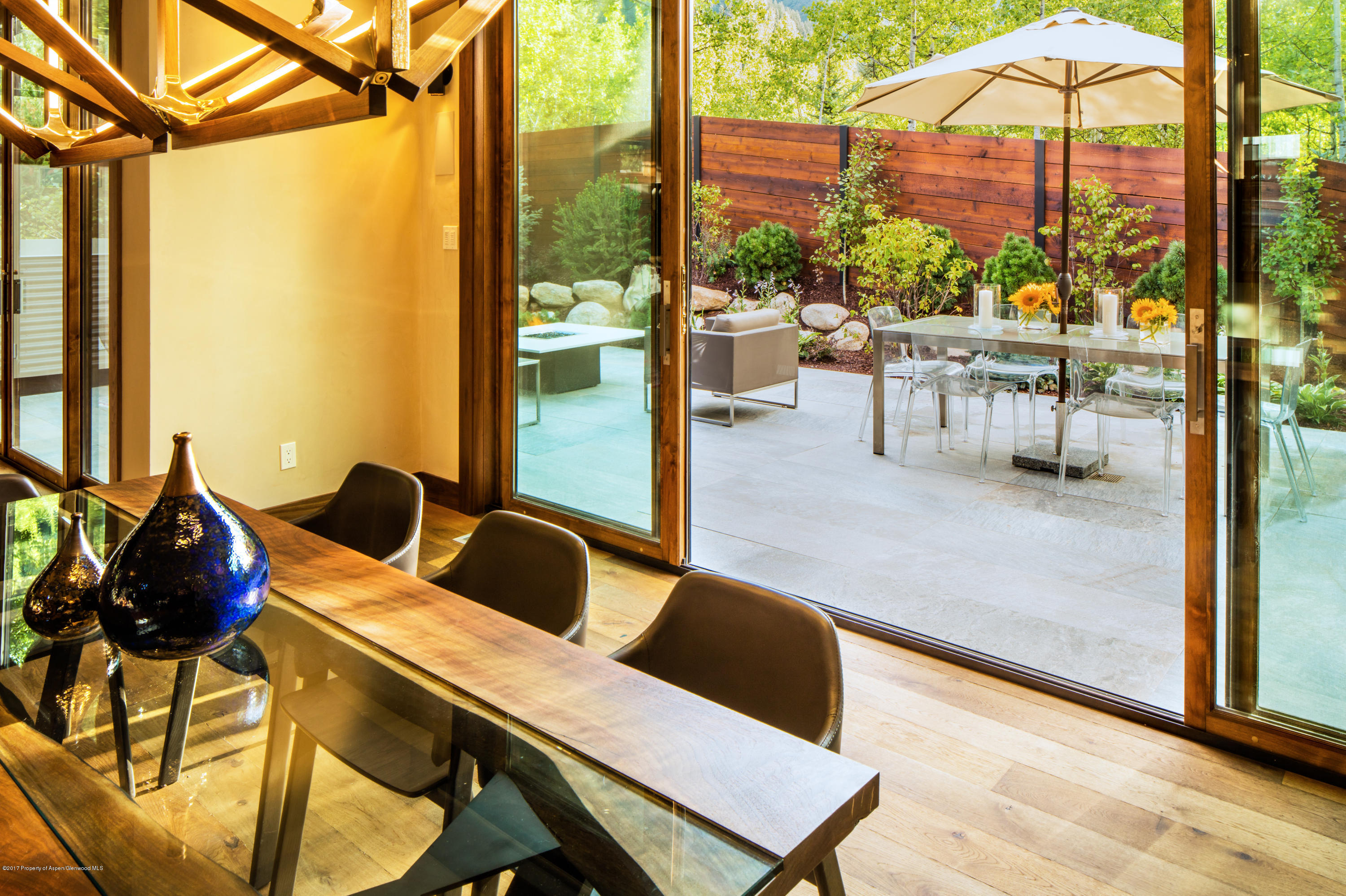 1195 Riverside Drive Aspen, CO 81611 - Photo 9 of 19 a balcony with table and chairs