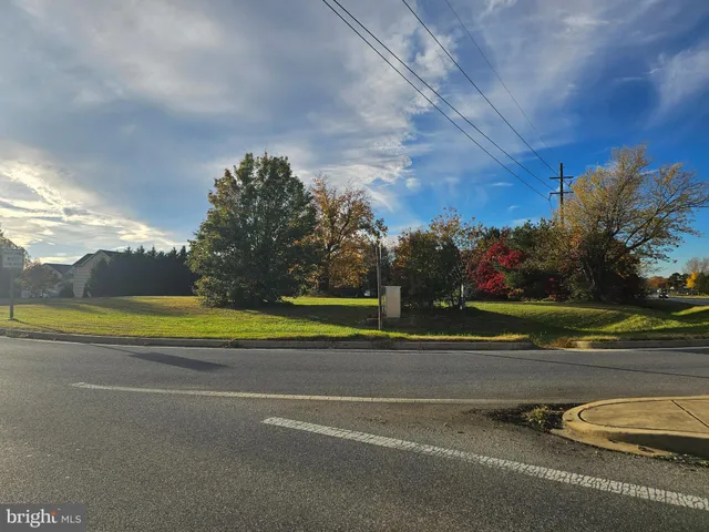 a view of a lake with a big yard