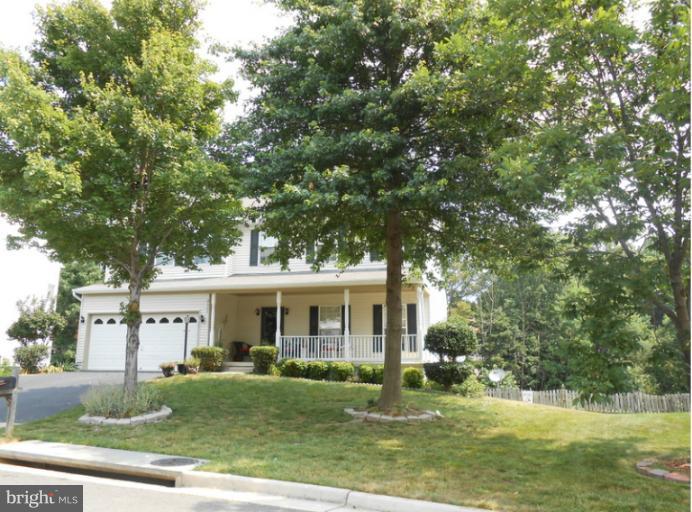 2685 Pheasant Hunt Road Woodbridge, VA 22192 - Photo 6 of 24 front view of a house with a yard