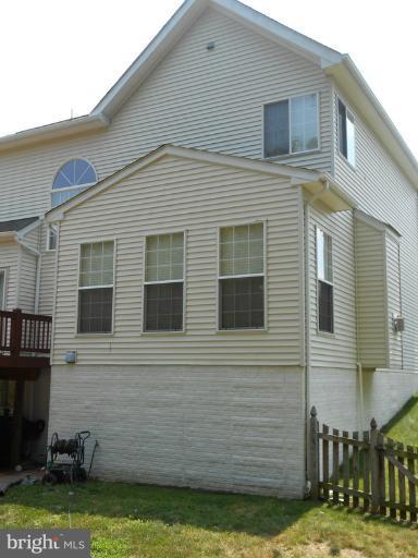 2685 Pheasant Hunt Road Woodbridge, VA 22192 - Photo 10 of 24 a view of a house with a yard