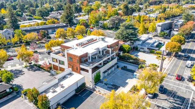 an aerial view of residential house with outdoor space and swimming pool