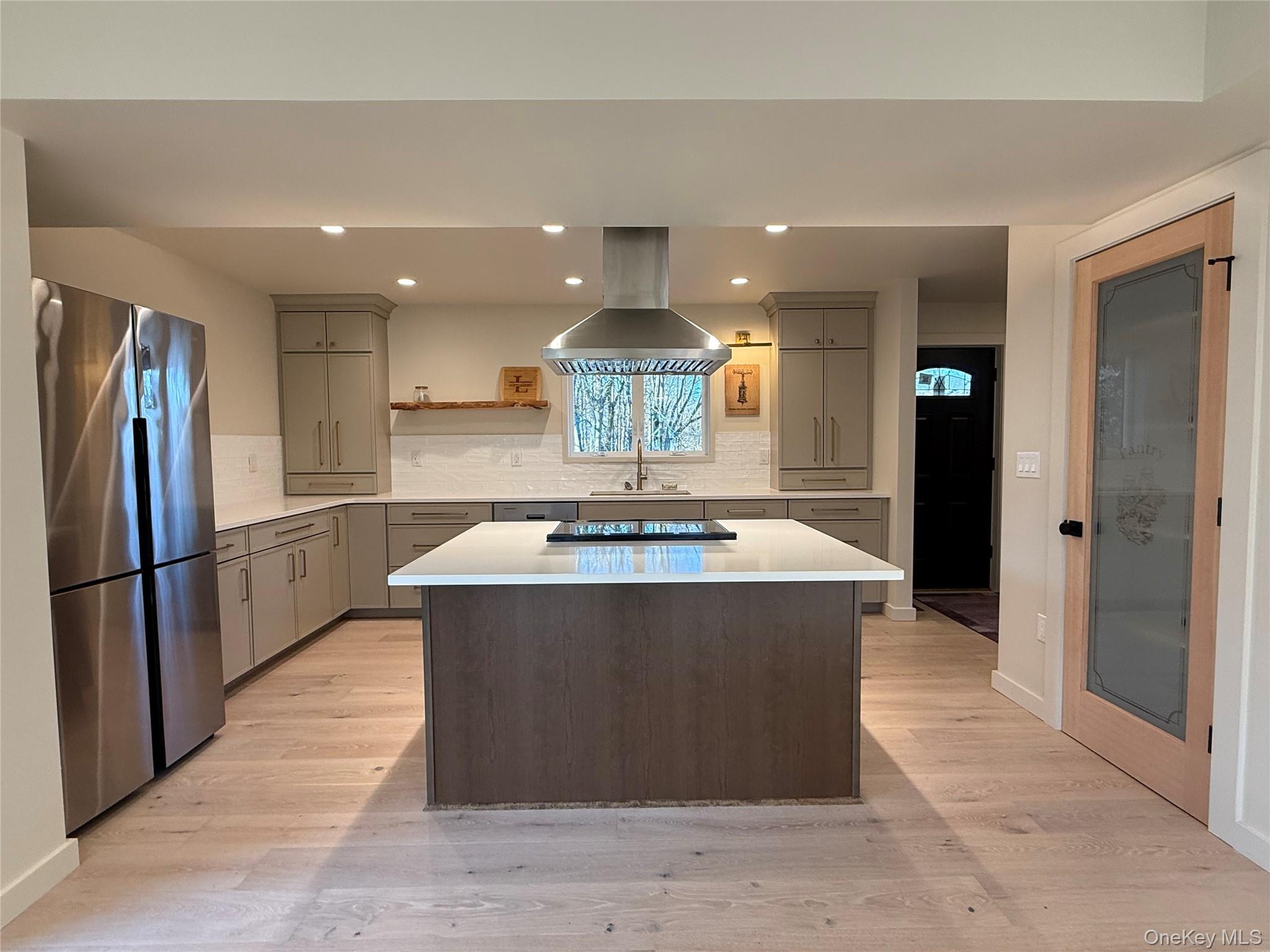 39 Falconer Street Beacon, NY 12508 - Photo 11 of 49 a view of kitchen with stainless steel appliances granite countertop a refrigerator and a stove top oven