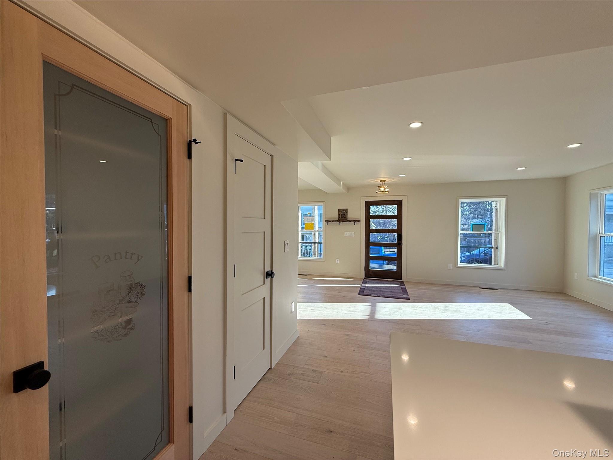 39 Falconer Street Beacon, NY 12508 - Photo 14 of 49 a view of a hallway with wooden shelves