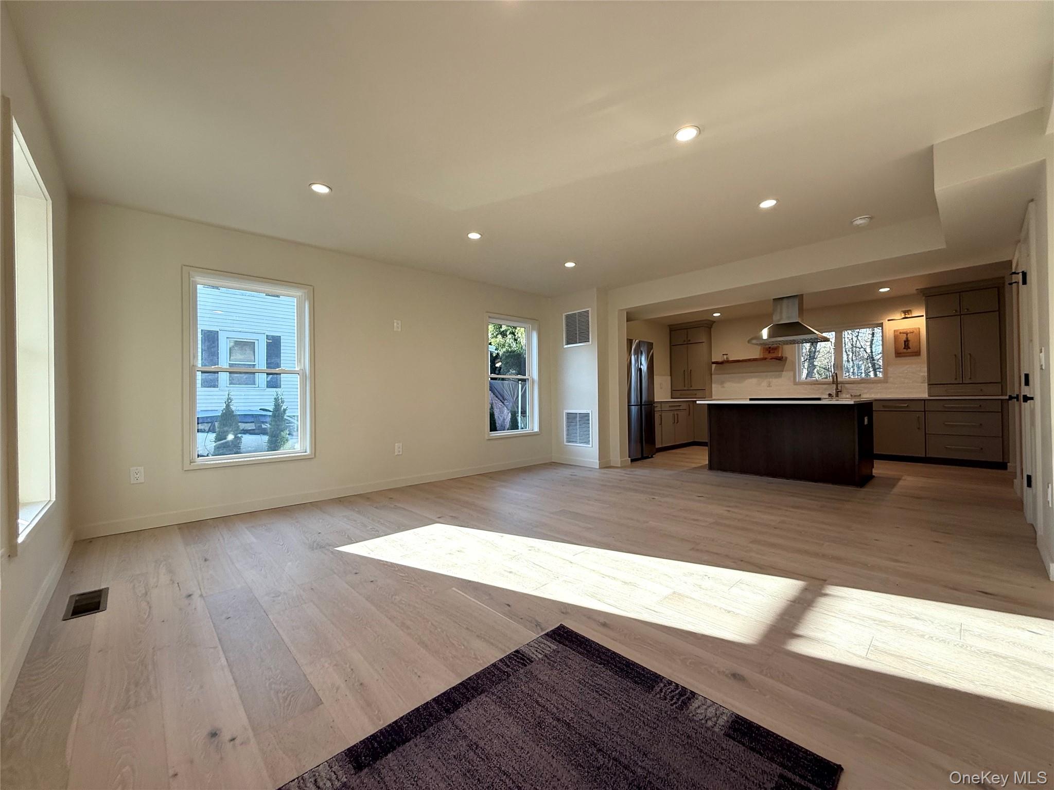 39 Falconer Street Beacon, NY 12508 - Photo 16 of 49 a view of kitchen and hall with wooden floor