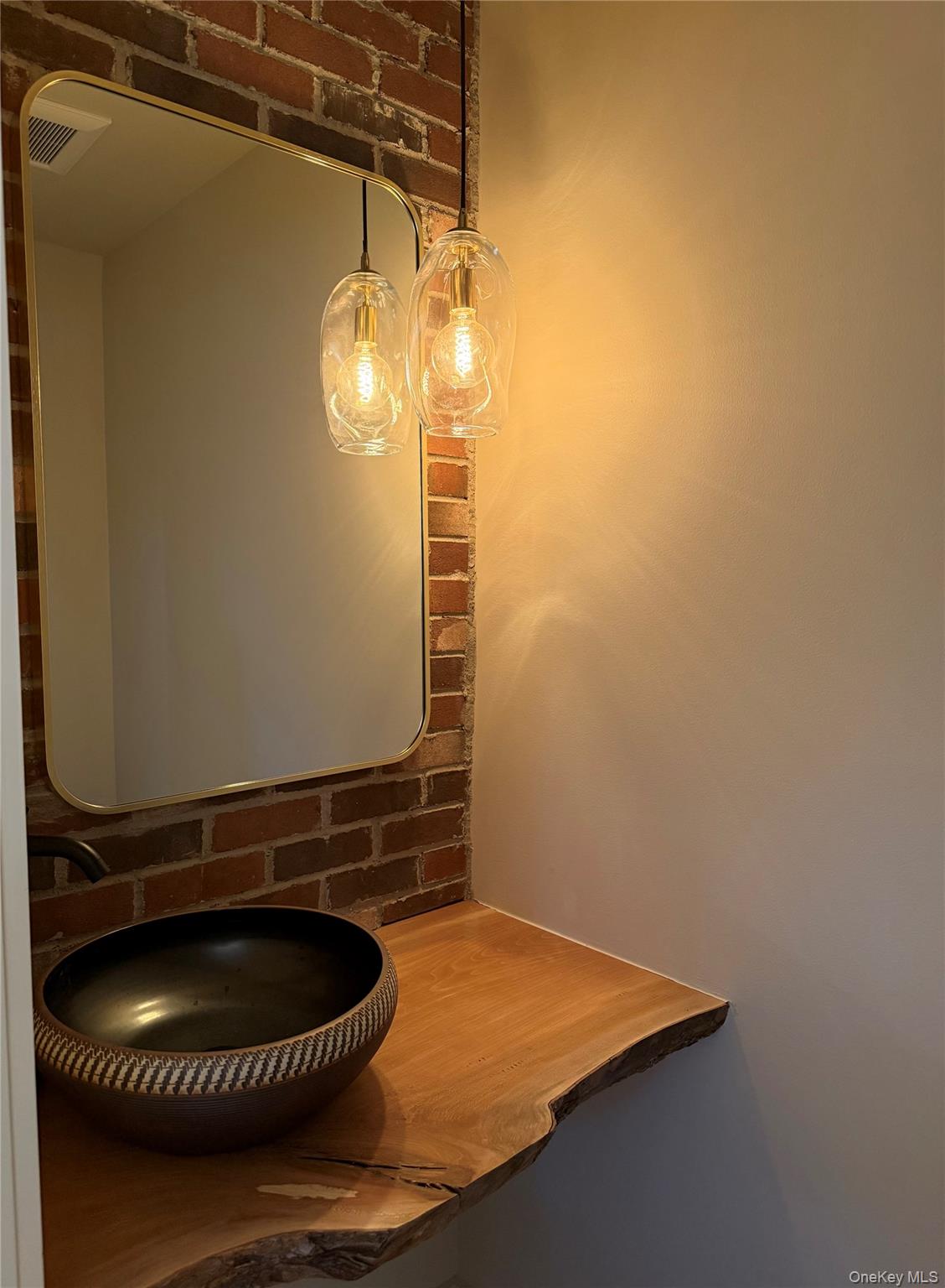 39 Falconer Street Beacon, NY 12508 - Photo 21 of 49 a bathroom with a granite countertop sink and a mirror