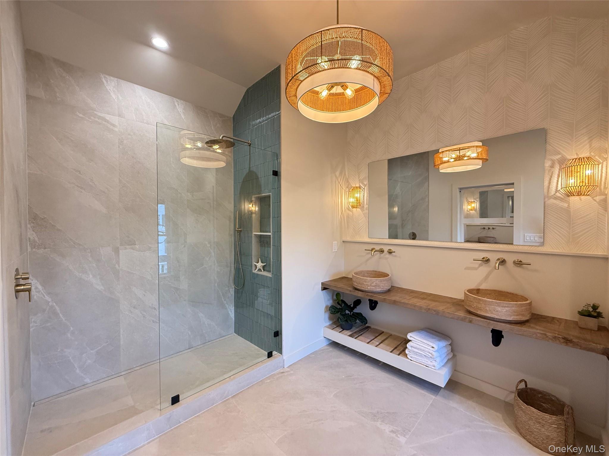 39 Falconer Street Beacon, NY 12508 - Photo 23 of 49 a room with a mirror and a glass door shower