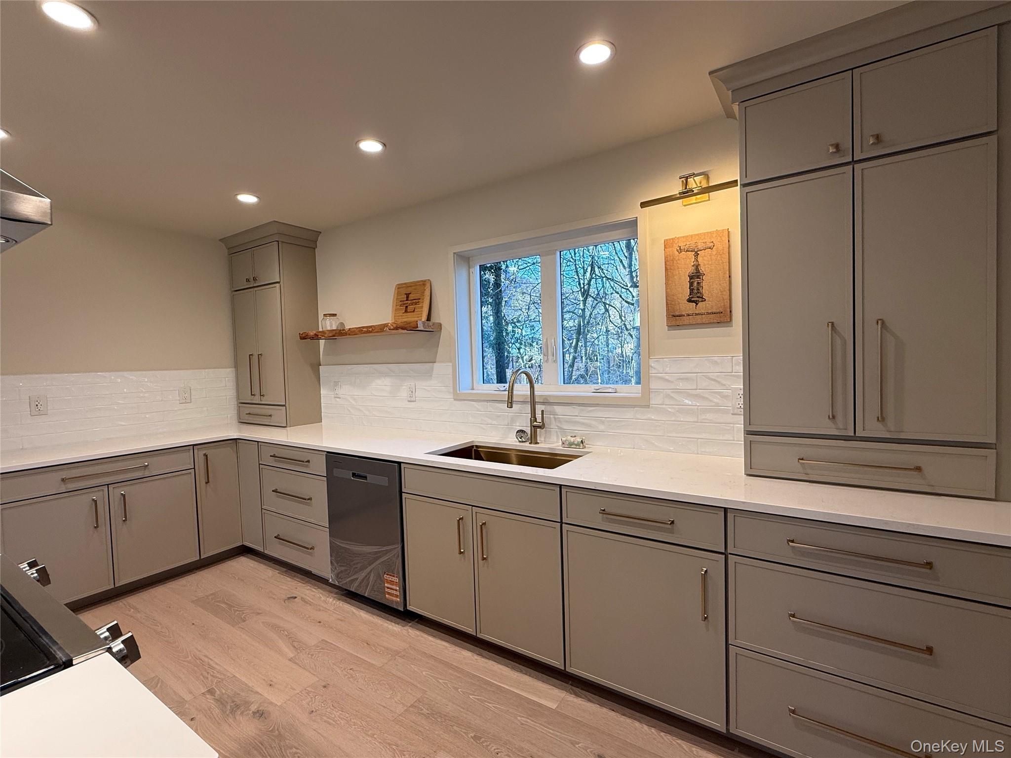 39 Falconer Street Beacon, NY 12508 - Photo 3 of 49 a kitchen with sink cabinets and window