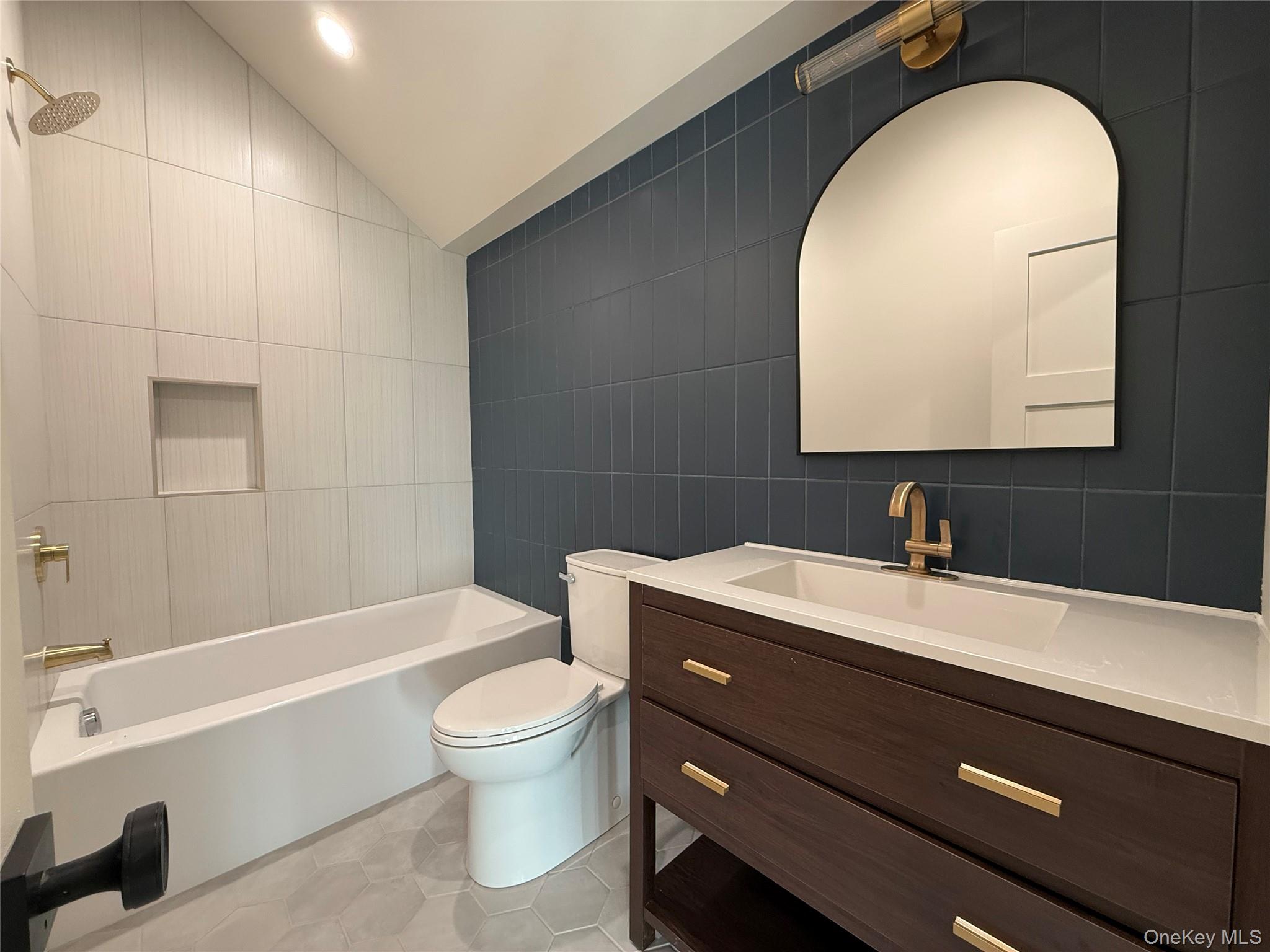 39 Falconer Street Beacon, NY 12508 - Photo 34 of 49 a bathroom with a sink a toilet and a bathtub