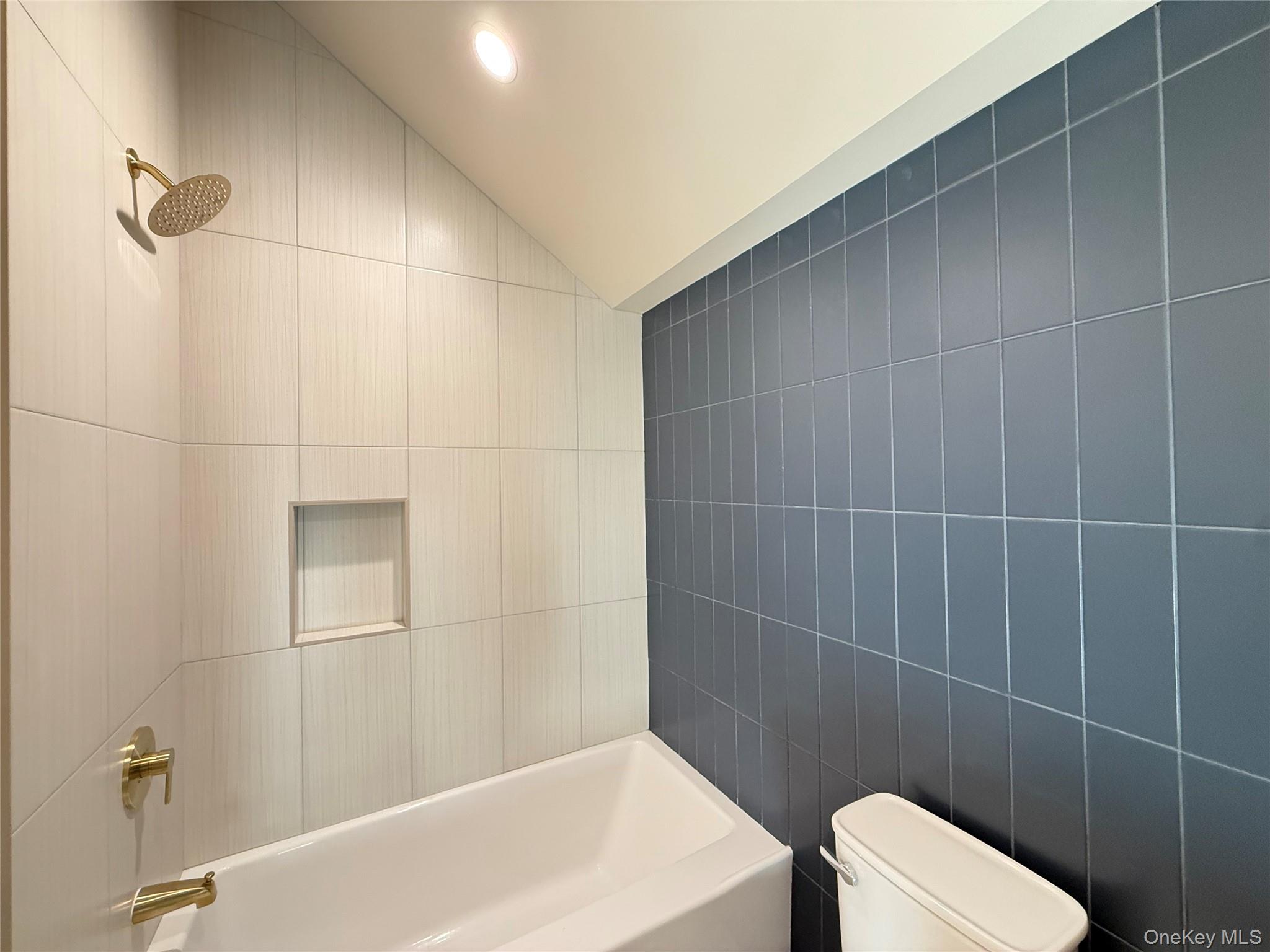 39 Falconer Street Beacon, NY 12508 - Photo 35 of 49 a bathroom with a sink a toilet a mirror and shower