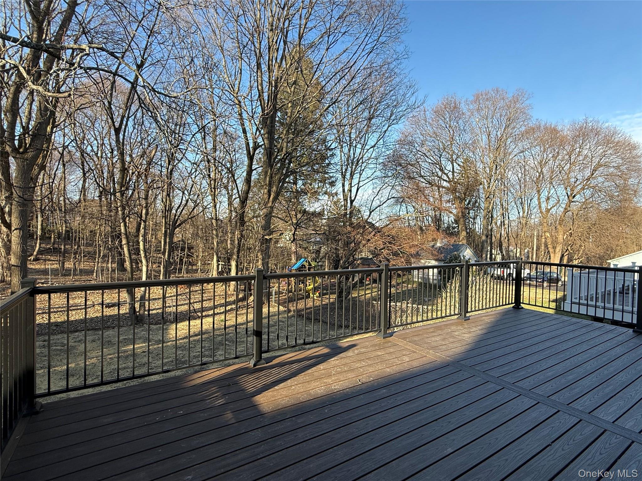 39 Falconer Street Beacon, NY 12508 - Photo 40 of 49 a view of balcony with wooden floor and fence