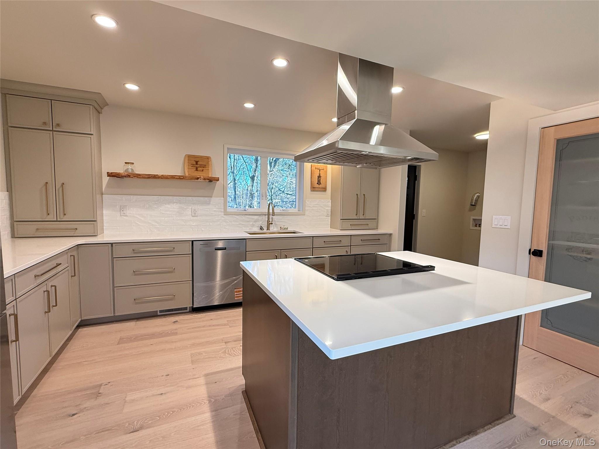 39 Falconer Street Beacon, NY 12508 - Photo 4 of 49 a kitchen with a stove a sink and a refrigerator