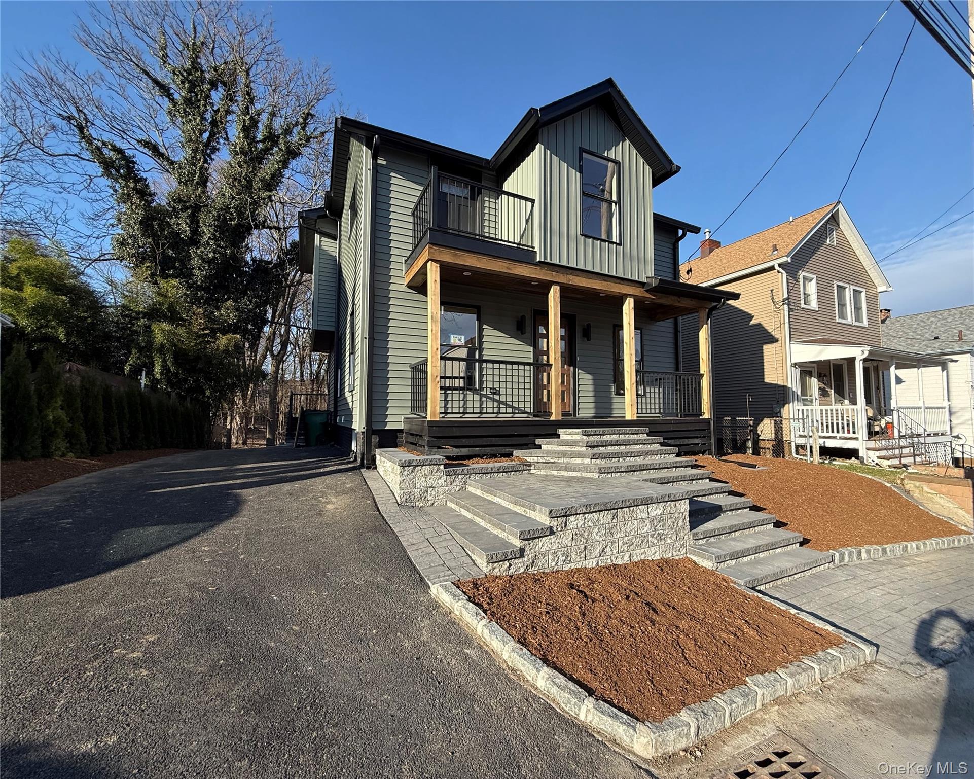 39 Falconer Street Beacon, NY 12508 - Photo 44 of 49 front view of a house with a yard