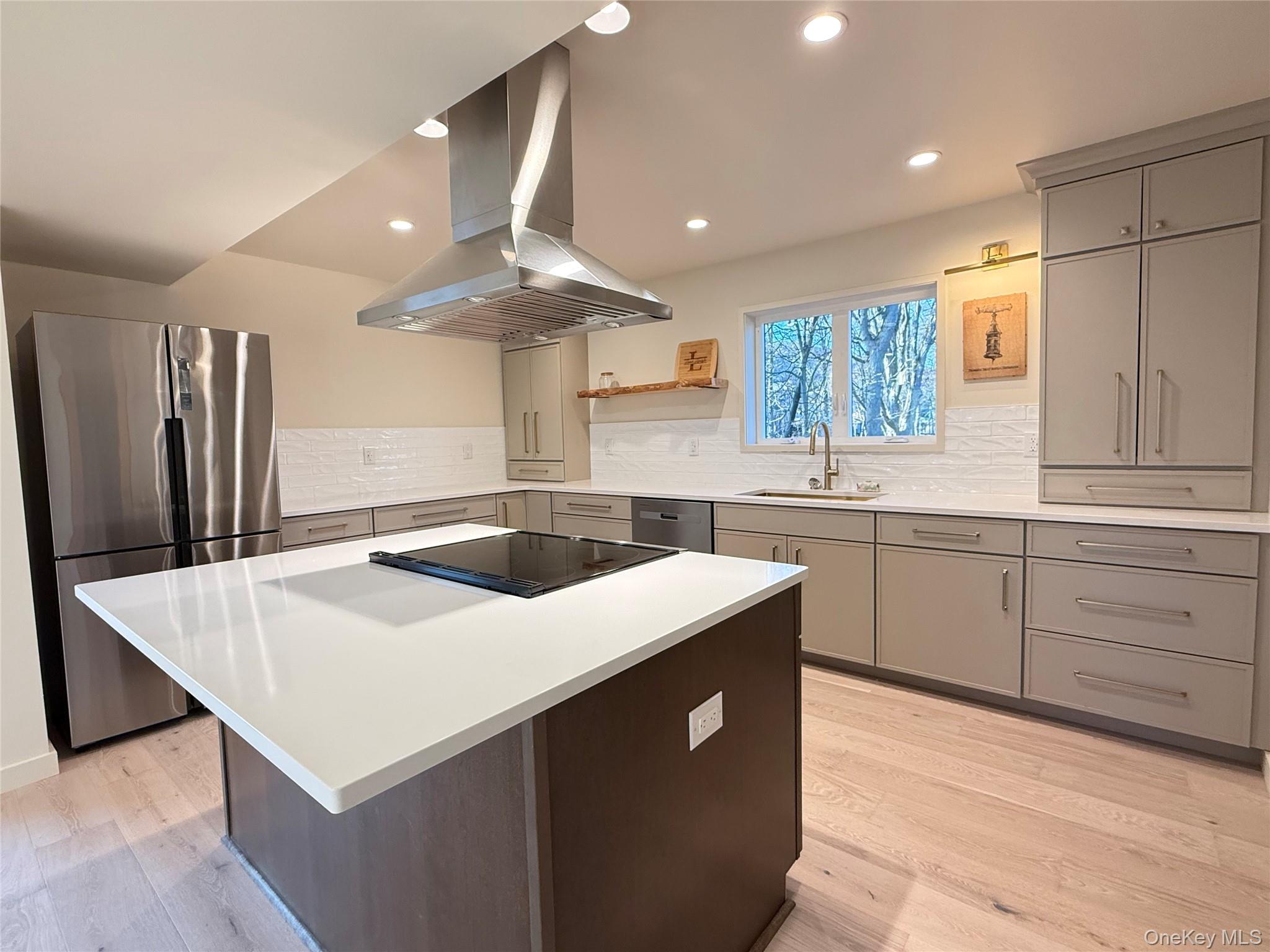 39 Falconer Street Beacon, NY 12508 - Photo 9 of 49 a kitchen with a stove a sink and a refrigerator
