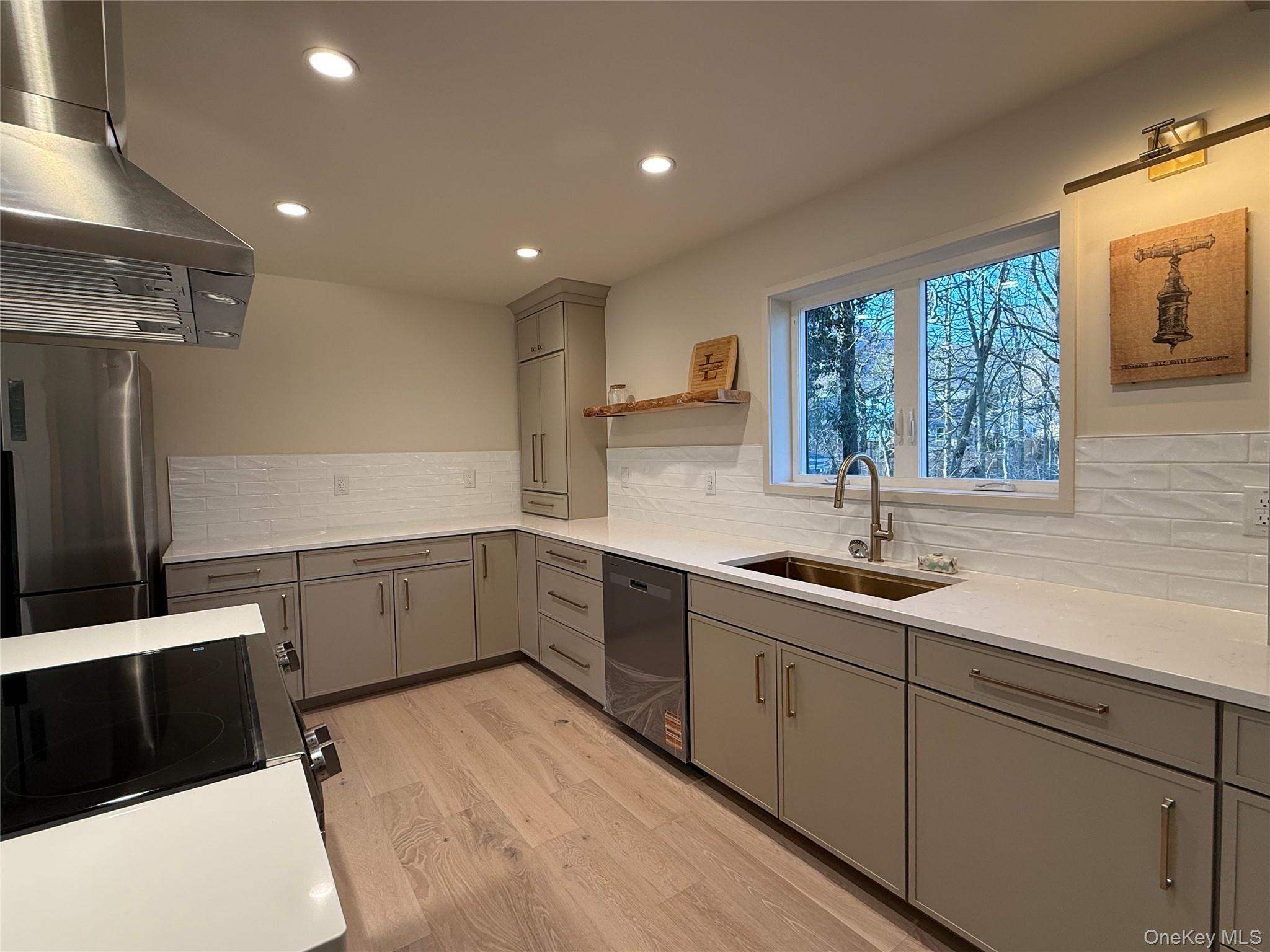 39 Falconer Street Beacon, NY 12508 - Photo 10 of 49 a kitchen with a sink and cabinets