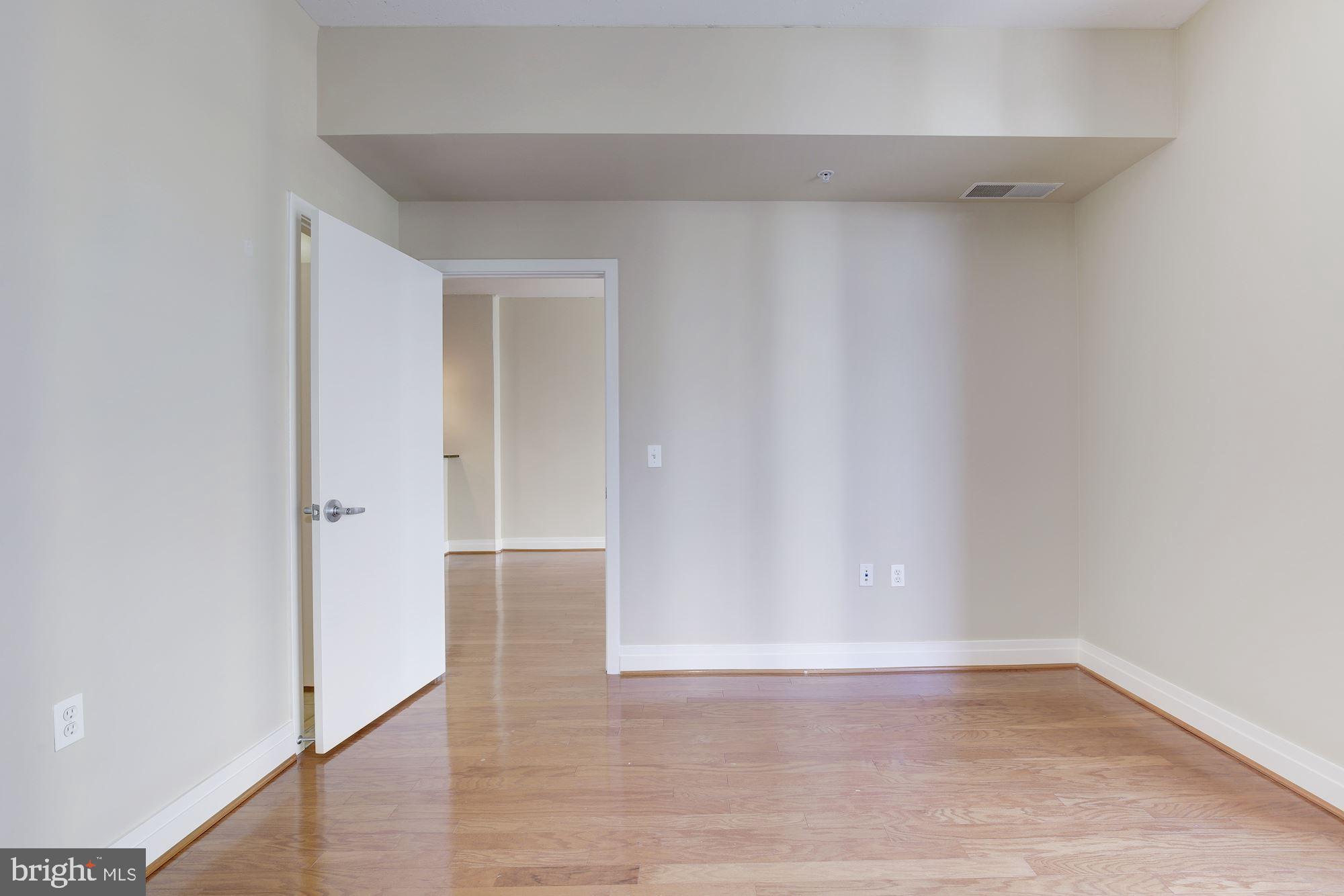 2120 Vermont Avenue Northwest, Unit 402 Washington, DC 20001 - Photo 23 of 41 a view of an empty room