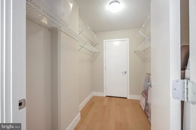 a view of hallway with shower