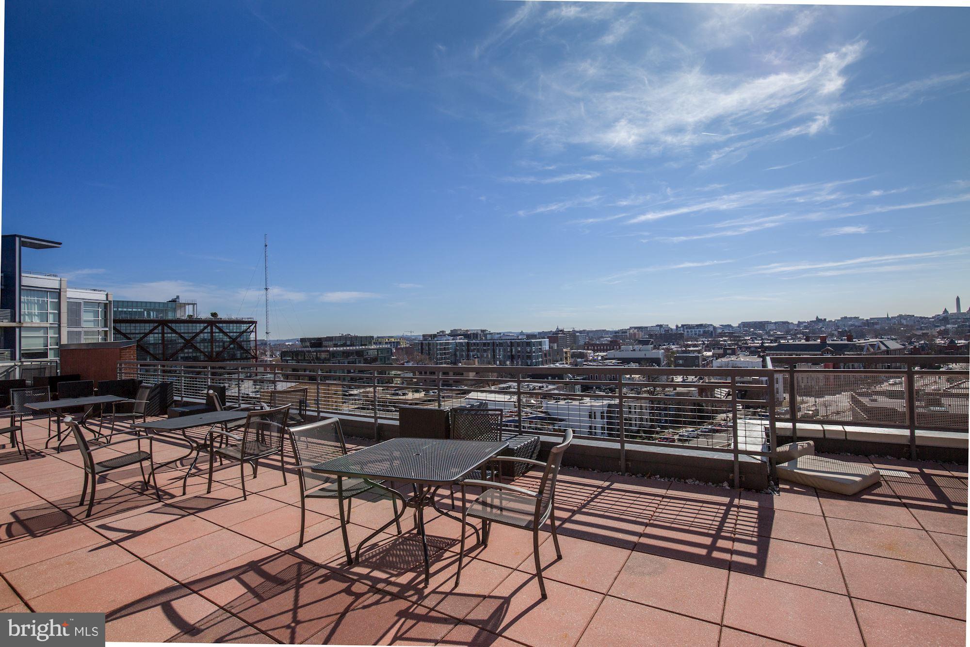 2120 Vermont Avenue Northwest, Unit 402 Washington, DC 20001 - Photo 32 of 41 a view of a terrace with sitting area