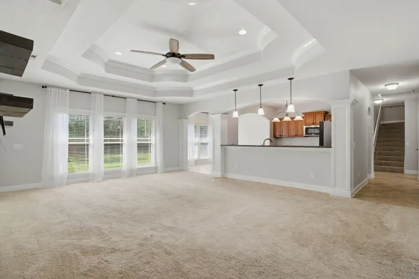 a view of a kitchen with a sink and cabinet area