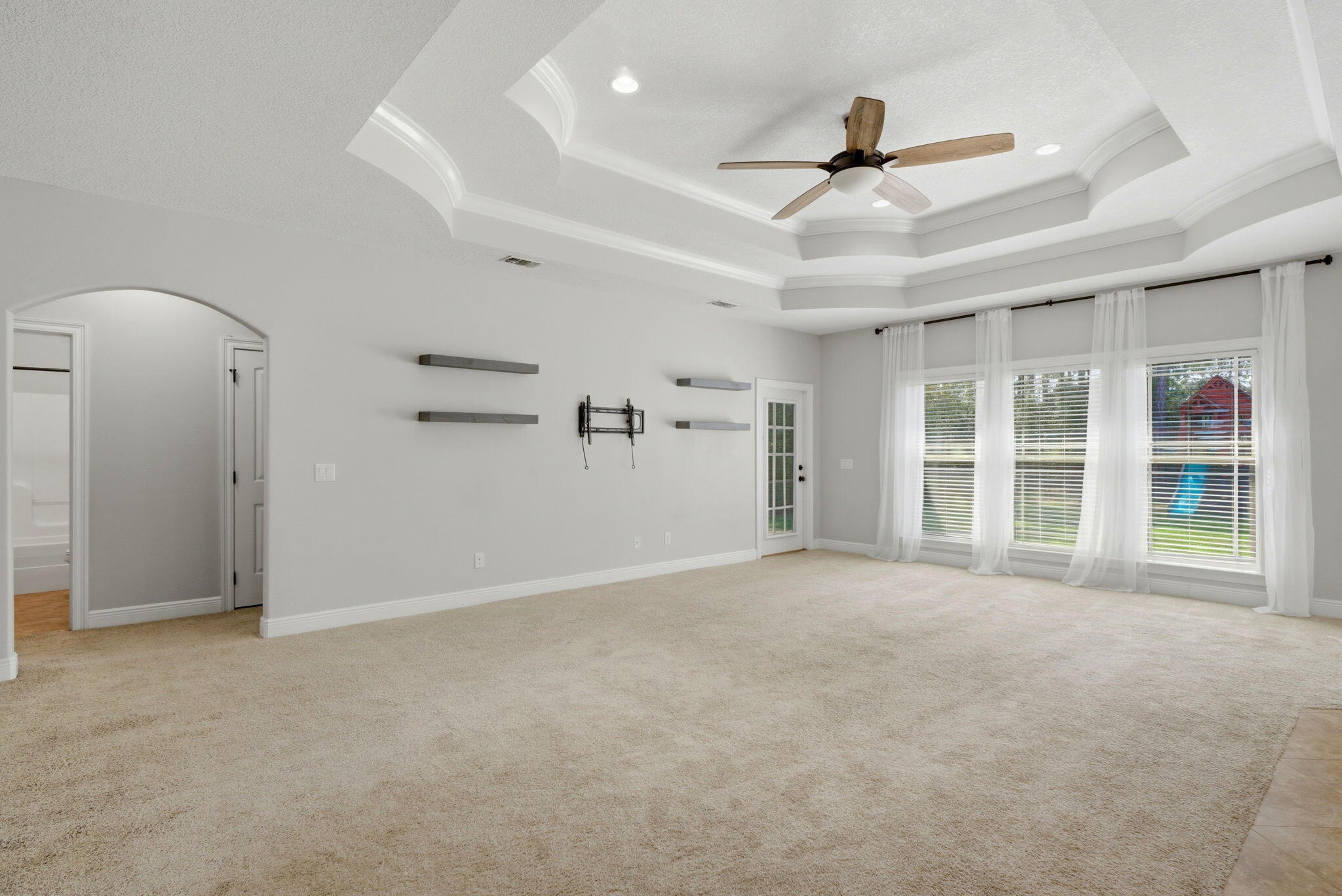 7151 Reef Street Navarre, FL 32566 - Photo 13 of 52 a view of an empty room with a window