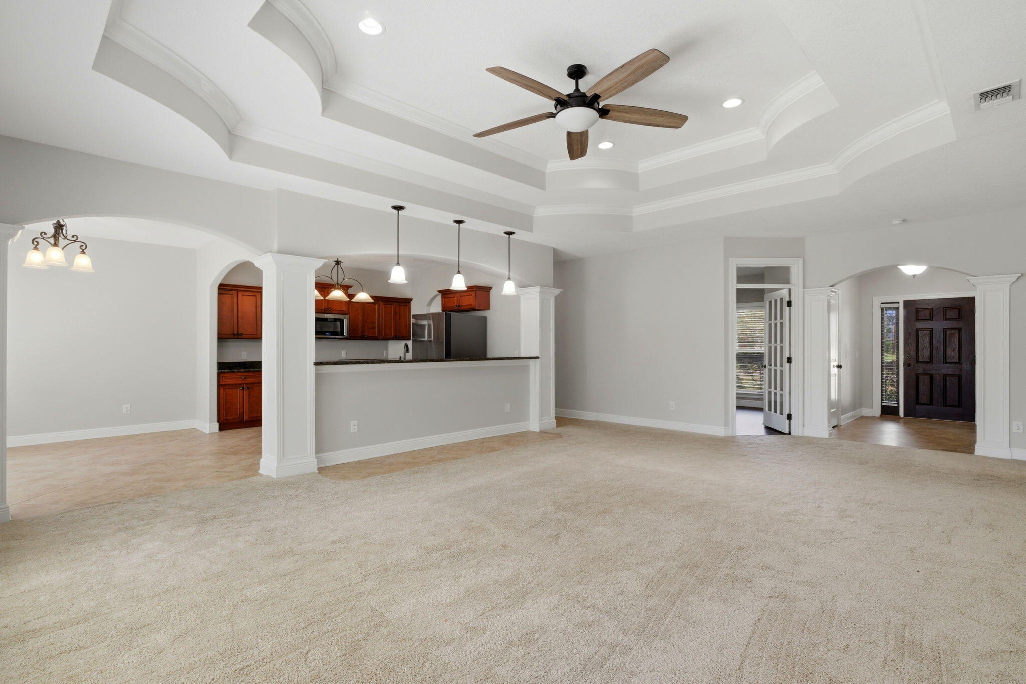 7151 Reef Street Navarre, FL 32566 - Photo 14 of 52 a view of a livingroom with a kitchen
