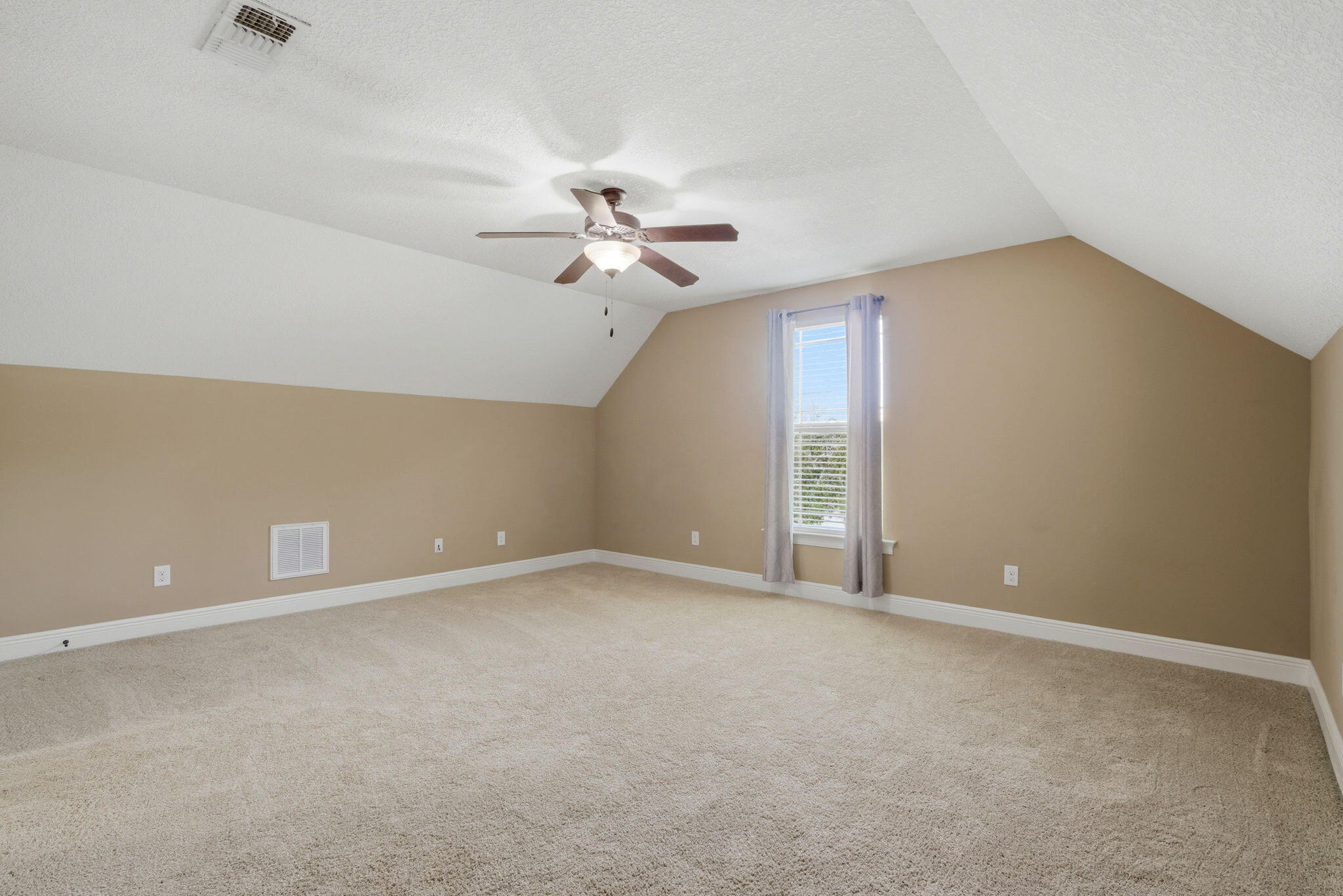 7151 Reef Street Navarre, FL 32566 - Photo 37 of 52 a view of an empty room with a window