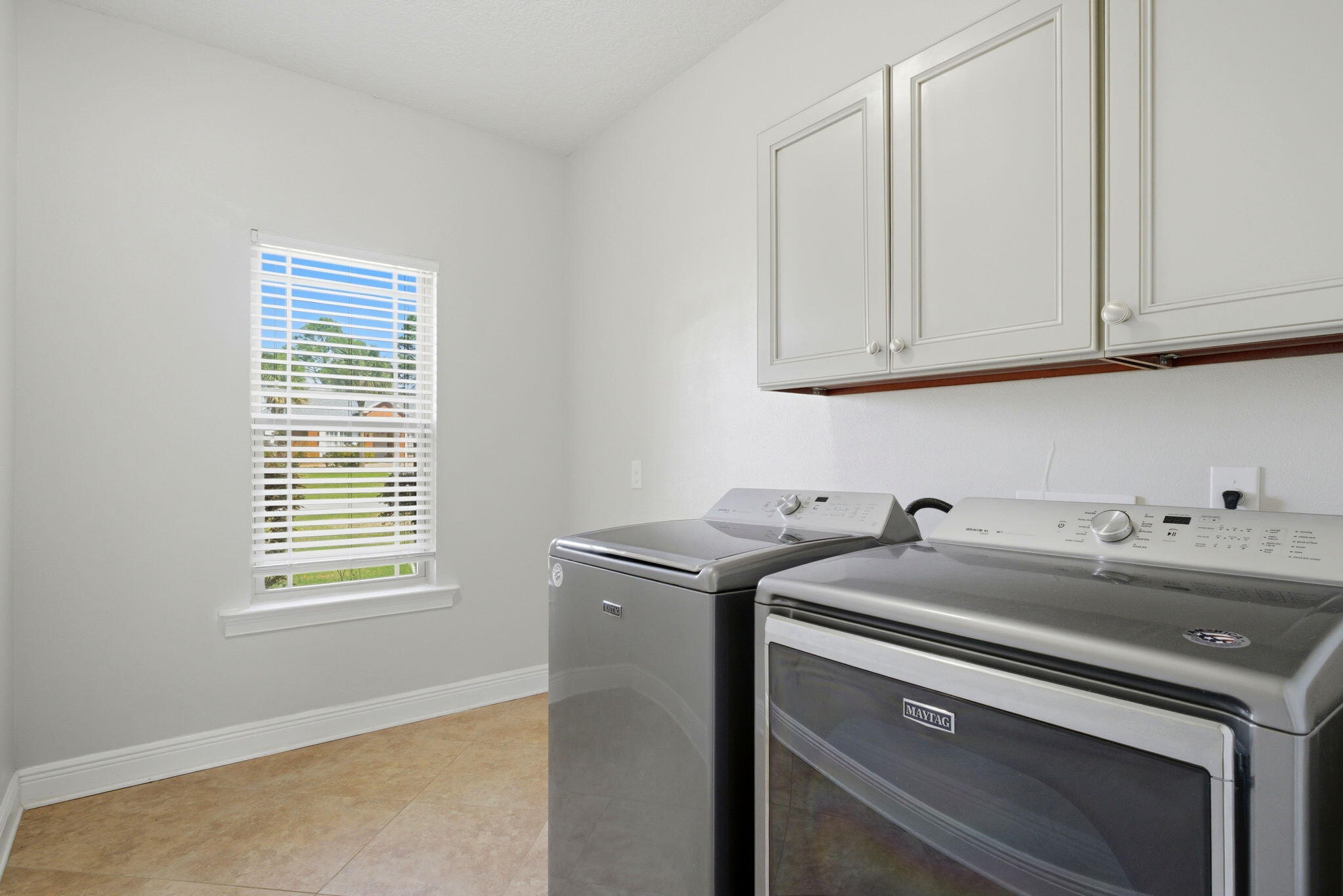 7151 Reef Street Navarre, FL 32566 - Photo 40 of 52 a utility room with dryer and washer