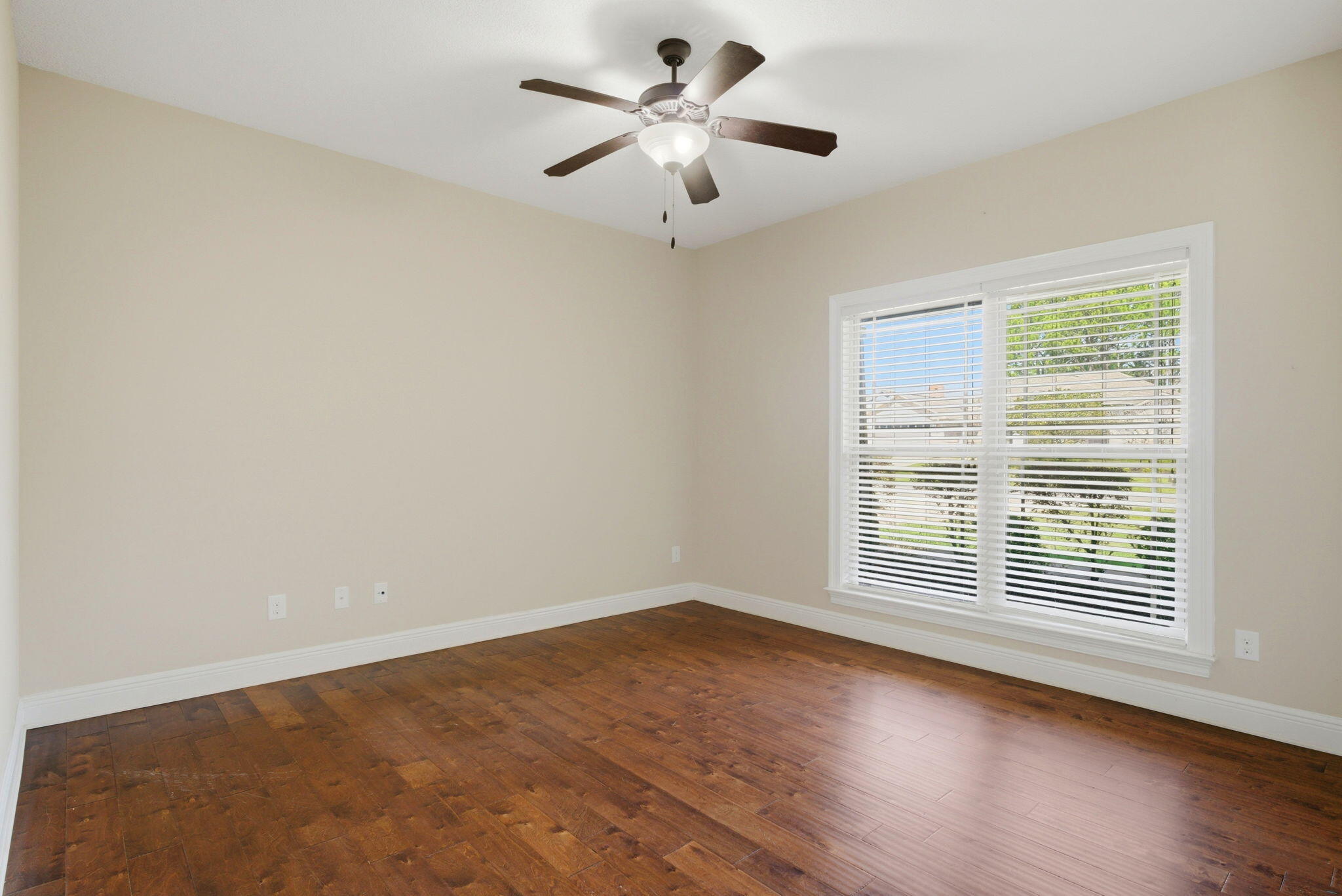 7151 Reef Street Navarre, FL 32566 - Photo 9 of 52 a view of an empty room with a window
