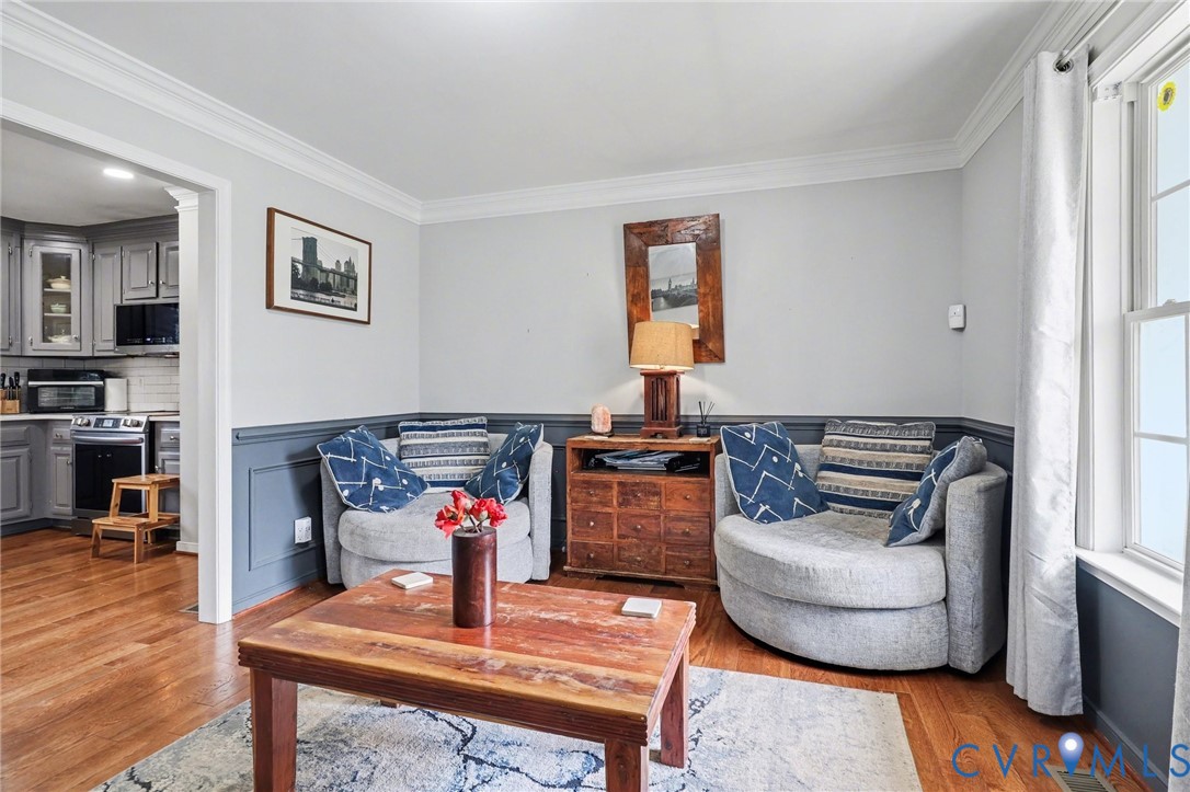 3247 Sherwood Ridge Drive Powhatan, VA 23139 - Photo 11 of 30 a living room with furniture and a wooden floor