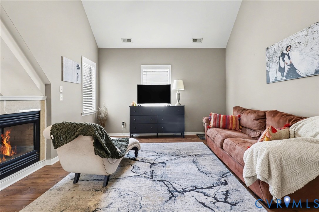 3247 Sherwood Ridge Drive Powhatan, VA 23139 - Photo 13 of 30 a living room with furniture and a fireplace