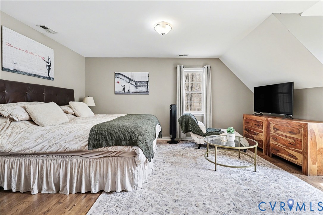 3247 Sherwood Ridge Drive Powhatan, VA 23139 - Photo 16 of 30 a bedroom with a bed and furniture