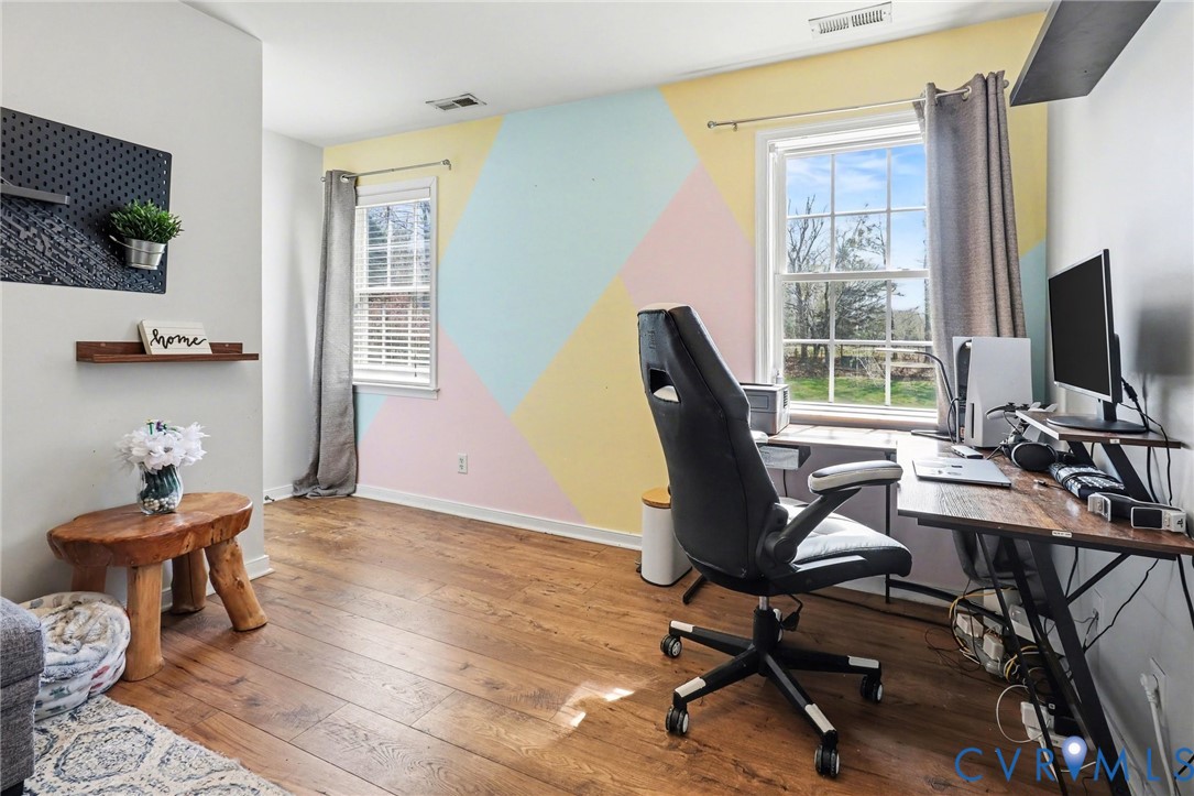 3247 Sherwood Ridge Drive Powhatan, VA 23139 - Photo 18 of 30 a view of a workspace with furniture and a window