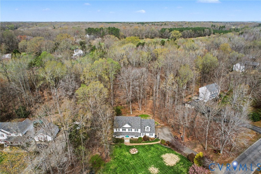 3247 Sherwood Ridge Drive Powhatan, VA 23139 - Photo 26 of 30 a view of a yard with an outdoor space
