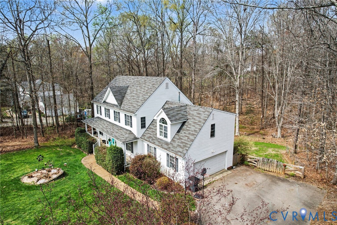 3247 Sherwood Ridge Drive Powhatan, VA 23139 - Photo 28 of 30 front view of a house with a yard