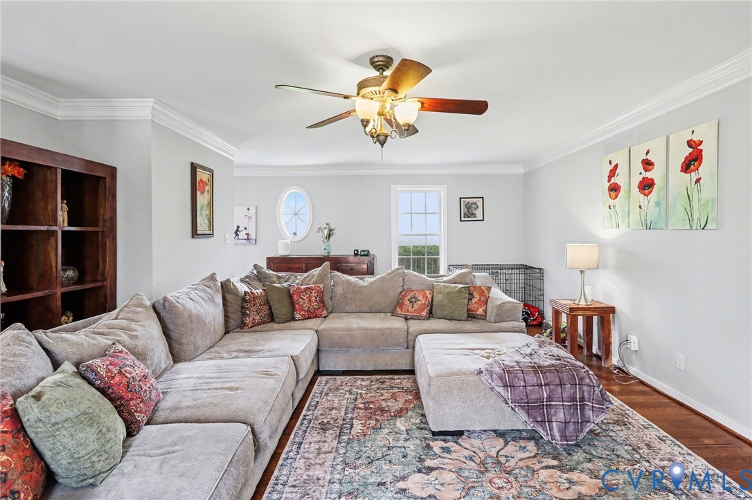3247 Sherwood Ridge Drive Powhatan, VA 23139 - Photo 5 of 30 a living room with furniture a rug and a window