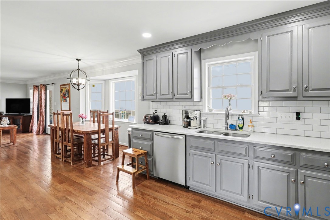3247 Sherwood Ridge Drive Powhatan, VA 23139 - Photo 10 of 30 a kitchen with sink cabinets and wooden floor
